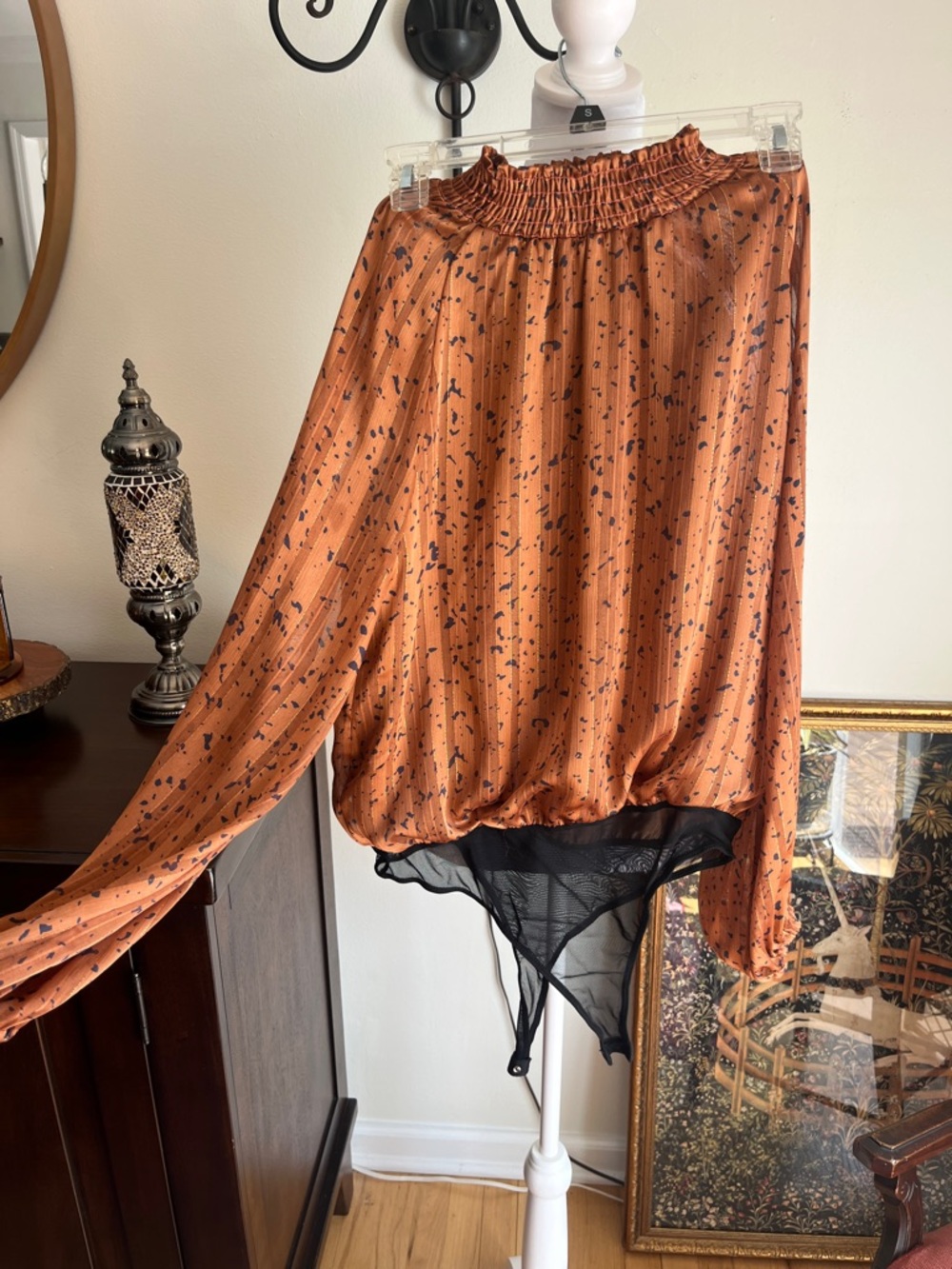 Lush Rust Orange Smocked Blouse with Black Print